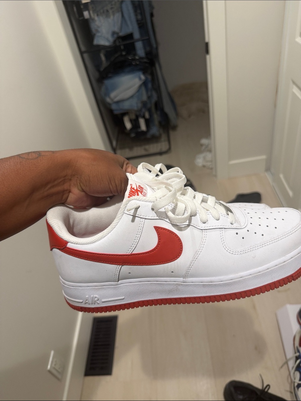 Nike Men’s White Sneakers with Red Swoosh